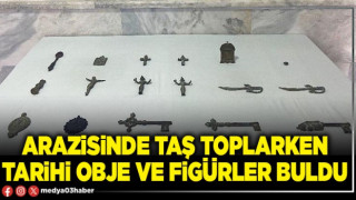 Arazisinde taş toplarken tarihi obje ve figürler buldu